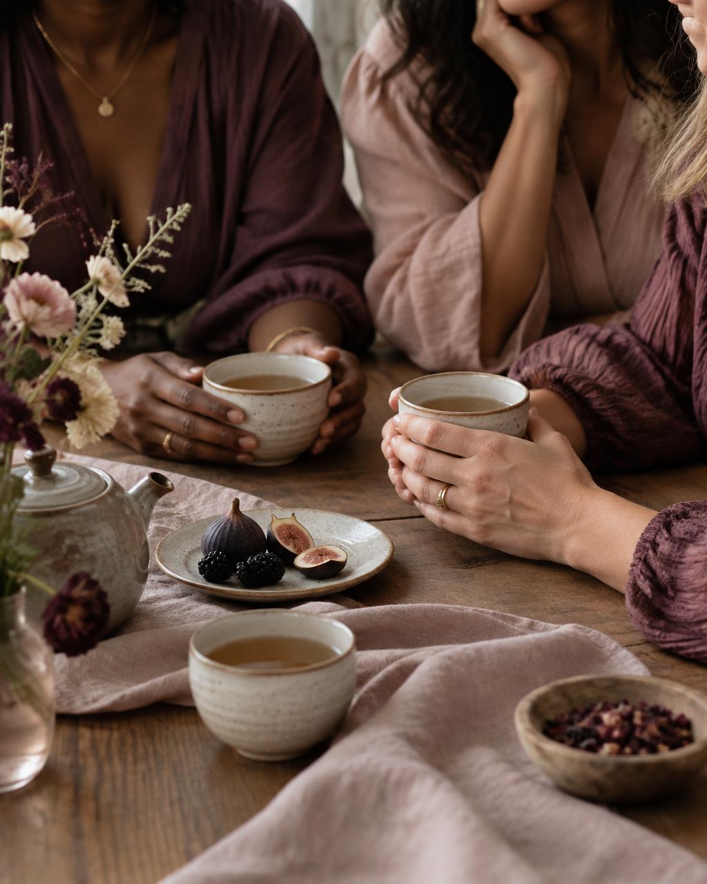 Women sharing tea together